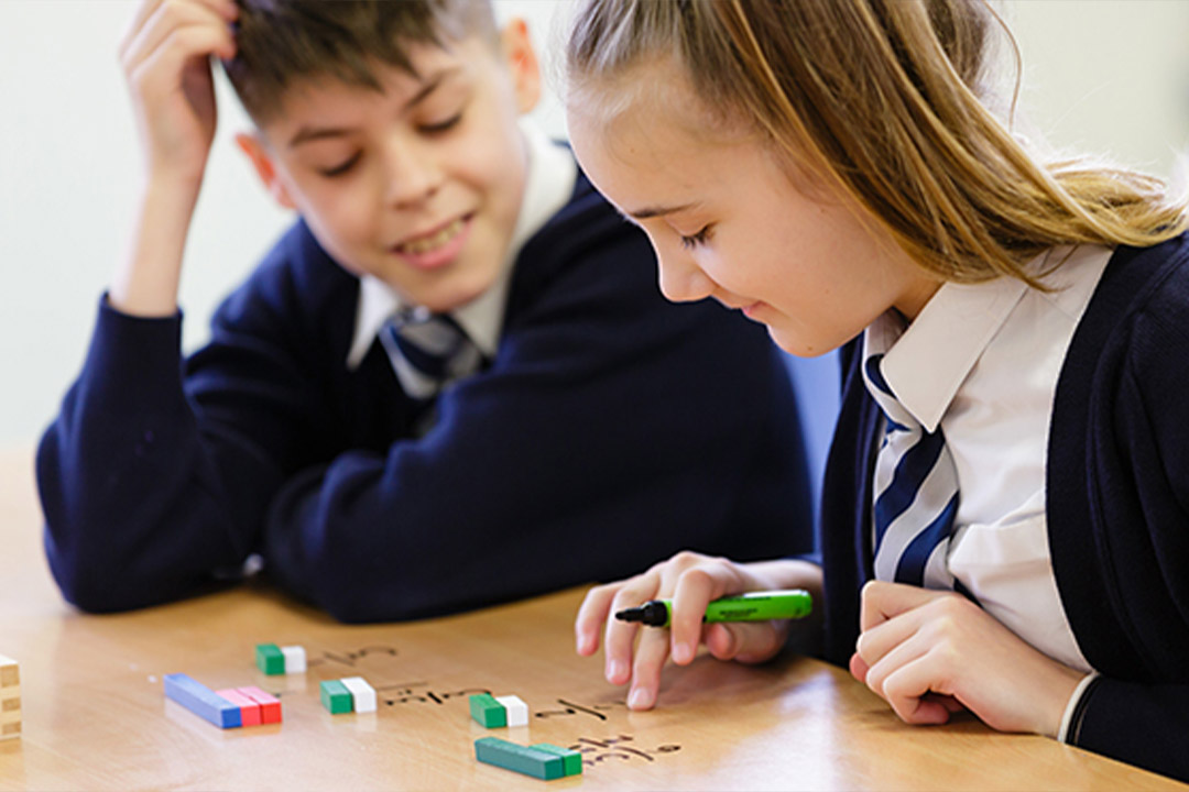 Improving maths in multi-academy trusts by engaging with Maths Hubs